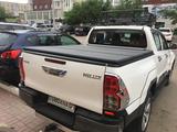 Крышка на кузов металлическая складная 3 секции Toyota Hilux с 2005-2022for355 000 тг. в Астана