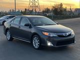 Toyota Camry 2014 года за 5 800 000 тг. в Актобе