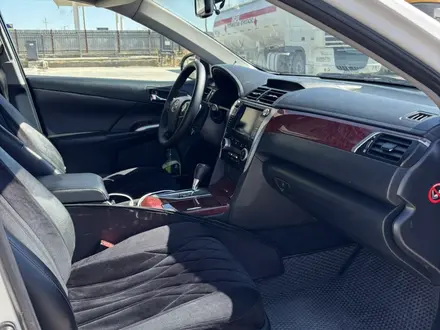 Toyota Camry 2013 года за 9 000 000 тг. в Жанаозен – фото 20