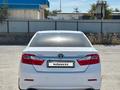 Toyota Camry 2013 года за 9 000 000 тг. в Жанаозен – фото 4