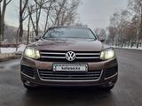 Volkswagen Touareg 2011 годаfor12 200 000 тг. в Алматы