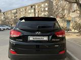 Hyundai Tucson 2012 годаүшін7 800 000 тг. в Актау – фото 3