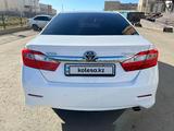 Toyota Camry 2013 года за 9 300 000 тг. в Актобе – фото 4