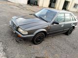 Mazda 323 1988 года за 1 750 000 тг. в Караганда – фото 4