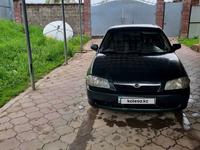 Mazda 323 1999 годаүшін1 900 000 тг. в Алматы