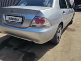 Mitsubishi Lancer 2010 года за 1 900 000 тг. в Алматы – фото 2