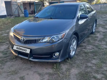 Toyota Camry 2014 года за 8 000 000 тг. в Караганда