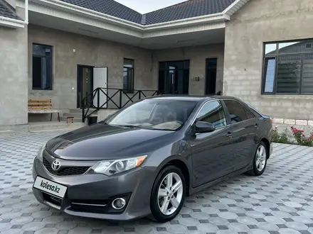 Toyota Camry 2013 года за 8 300 000 тг. в Жанаозен