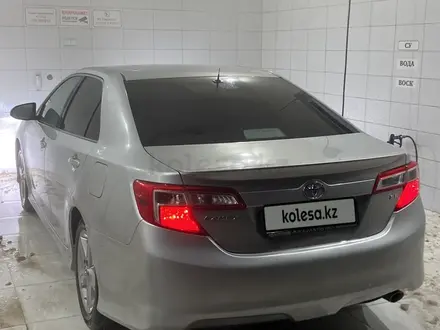 Toyota Camry 2014 года за 7 700 000 тг. в Жанаозен – фото 6