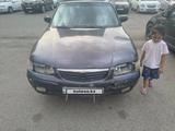 Mazda 626 1998 года за 1 050 000 тг. в Астана – фото 4