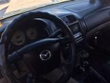 Mazda 323 2002 года за 1 800 000 тг. в Алматы – фото 4