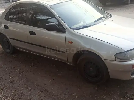 Mazda 323 1995 года за 650 000 тг. в Алматы – фото 4