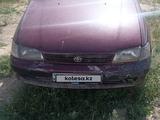 Toyota Carina E 1994 года за 700 000 тг. в Жетиген – фото 4