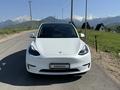 Tesla Model Y 2024 года за 19 500 000 тг. в Алматы – фото 2