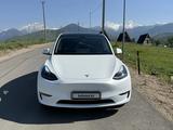 Tesla Model Y 2024 года за 19 800 000 тг. в Алматы – фото 2