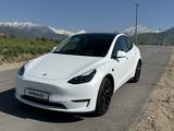 Tesla Model Y 2024 года за 19 800 000 тг. в Алматы