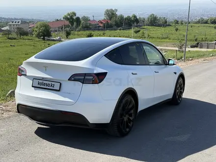 Tesla Model Y 2024 года за 19 500 000 тг. в Алматы – фото 4