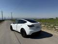 Tesla Model Y 2024 года за 19 500 000 тг. в Алматы – фото 5