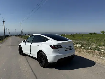 Tesla Model Y 2024 года за 19 500 000 тг. в Алматы – фото 5