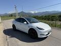 Tesla Model Y 2024 года за 19 500 000 тг. в Алматы – фото 6