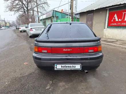 Mazda 323 1994 года за 870 000 тг. в Алматы – фото 2