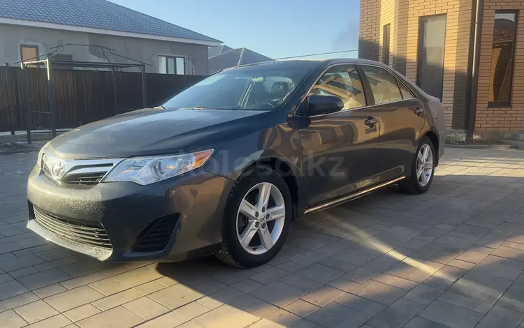 Toyota Camry 2014 годаfor5 400 000 тг. в Актобе