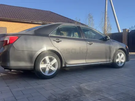 Toyota Camry 2014 года за 5 400 000 тг. в Актобе – фото 5