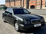 Mercedes-Benz E 230 1997 года за 1 850 000 тг. в Астана
