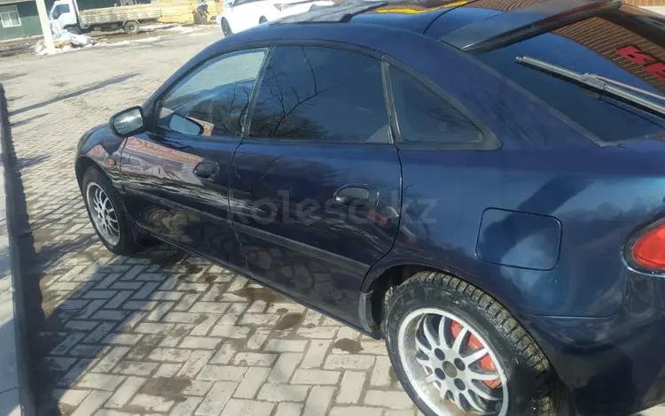 Mazda 323 1996 годаүшін1 400 000 тг. в Алматы