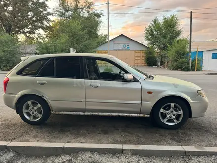 Mazda 323 2003 года за 1 800 000 тг. в Талдыкорган – фото 4