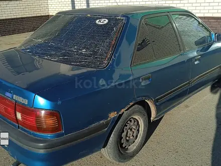 Mazda 323 1994 года за 500 000 тг. в Актобе – фото 4