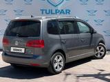 Volkswagen Touran 2010 года за 5 890 000 тг. в Алматы – фото 3
