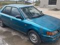 Mazda 323 1992 года за 400 000 тг. в Астана – фото 2