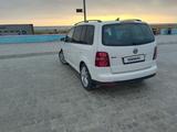 Volkswagen Touran 2008 годаfor4 000 000 тг. в Актау – фото 3