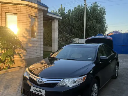 Toyota Camry 2013 года за 5 390 000 тг. в Актобе