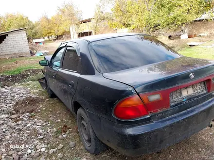 Mazda 323 1996 года за 300 000 тг. в Шымкент – фото 4