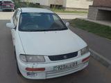 Mazda Familia 1995 года за 350 000 тг. в Астана – фото 2