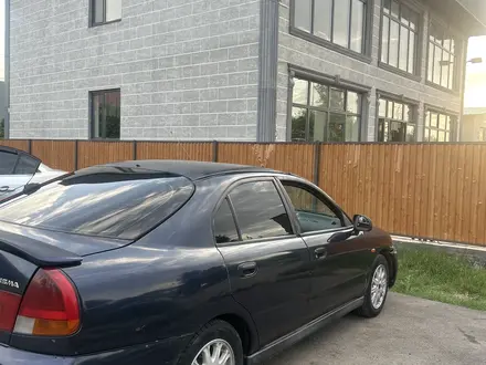 Mitsubishi Carisma 1995 года за 1 100 000 тг. в Алматы – фото 2