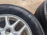 Диски с шинами от Ниссан Эльгранд Е50 Yokohama Bluearth 215/65R15, 6*139.7 за 120 000 тг. в Алматы – фото 4