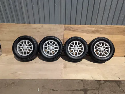 Диски с шинами от Ниссан Эльгранд Е50 Yokohama Bluearth 215/65R15, 6*139.7 за 120 000 тг. в Алматы