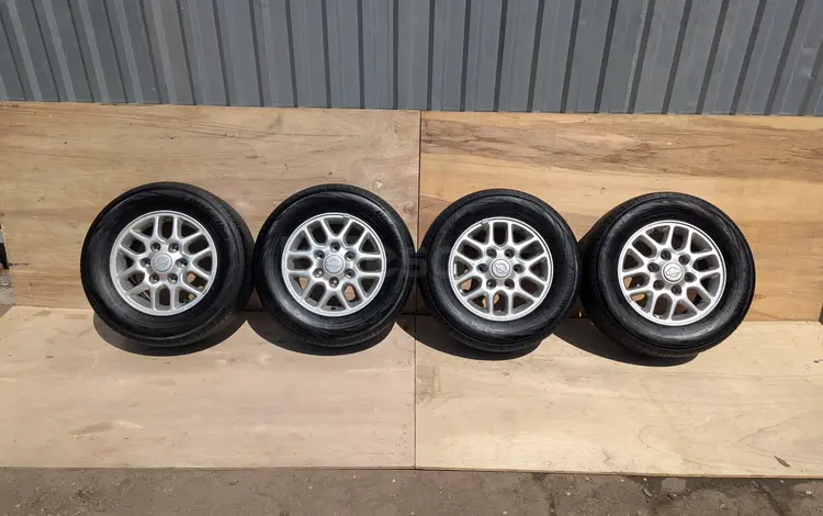 Диски с шинами от Ниссан Эльгранд Е50 Yokohama Bluearth 215/65R15, 6*139.7 за 120 000 тг. в Алматы