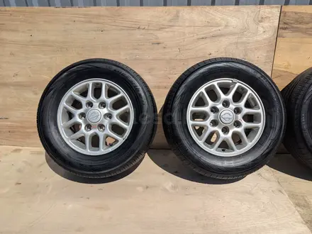Диски с шинами от Ниссан Эльгранд Е50 Yokohama Bluearth 215/65R15, 6*139.7 за 120 000 тг. в Алматы – фото 3