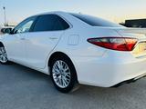 Toyota Camry 2015 года за 7 300 000 тг. в Жанаозен – фото 4