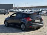 Ford Focus 2011 года за 2 350 000 тг. в Атырау – фото 4