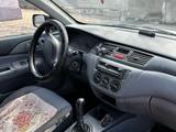 Mitsubishi Lancer 2002 годаfor700 000 тг. в Турара Рыскулова – фото 2