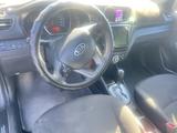 Kia Rio 2013 года за 4 100 000 тг. в Караганда – фото 2