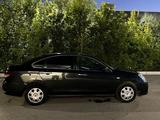Nissan Almera 2014 года за 3 200 000 тг. в Караганда – фото 3