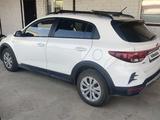 Kia Rio X-Line 2021 года за 8 700 000 тг. в Кульсары – фото 2