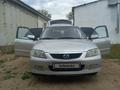 Mazda 323 2002 года за 2 200 000 тг. в Актобе – фото 8