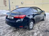 Toyota Corolla 2014 годаfor6 800 000 тг. в Алматы – фото 4